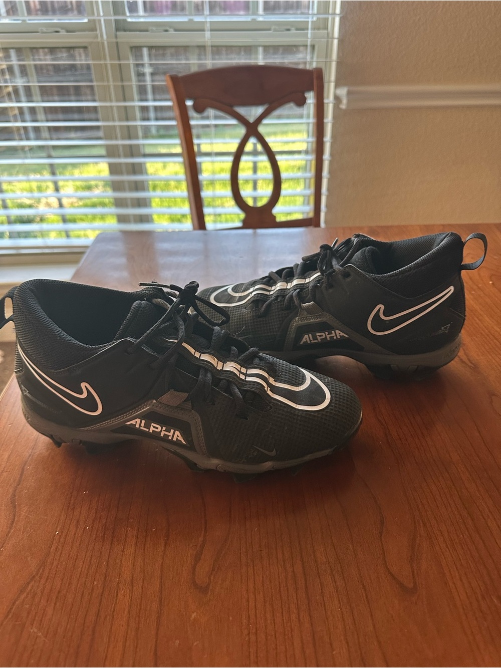 Nike Black and White Men’s Alpha Athletic Cleats